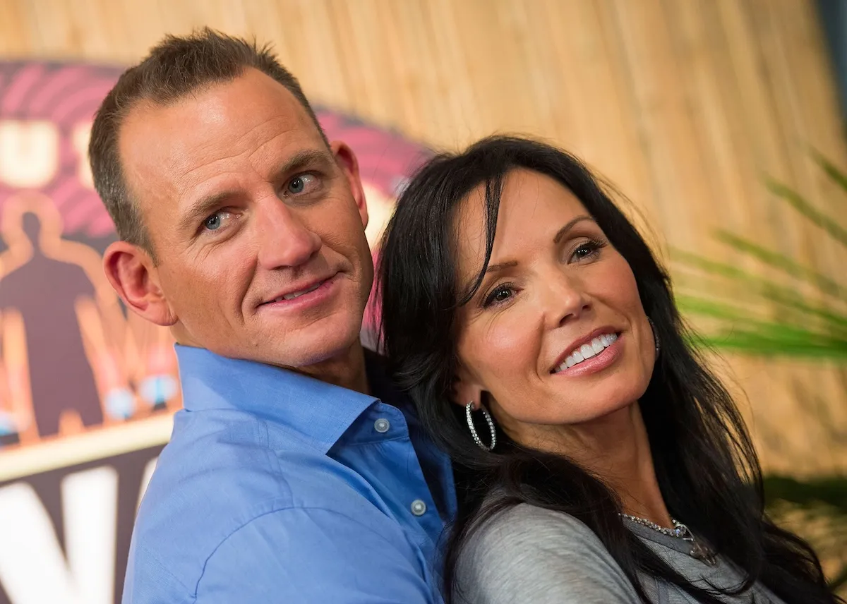 A close-up of 'Survivor' couple Brad and Monica Culpepper holding each other and smiling in 2013