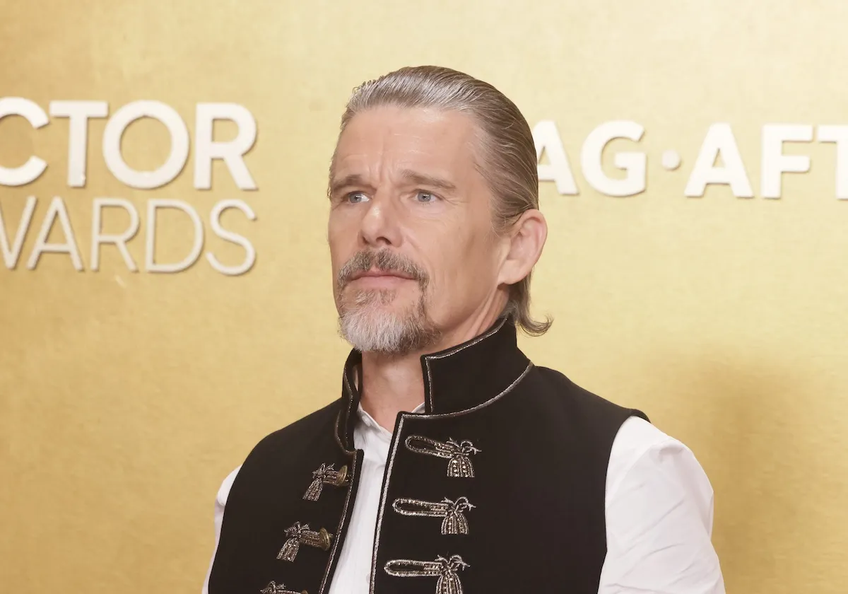 Ethan Hawke wearing a military-style jacket