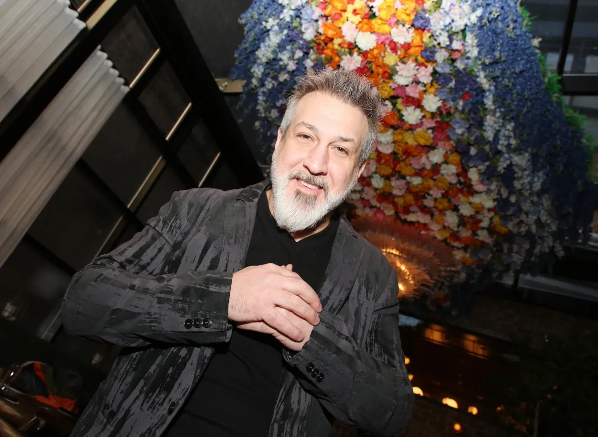 Low-angle photo of Joey Fatone with a beard