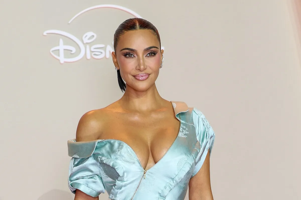 Kim Kardashian in a light blue one shoulder dress