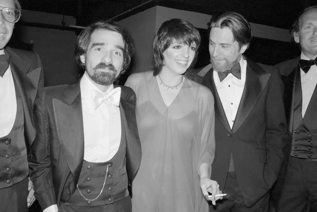 A black and white picture of Martin Scorsese, Liza Minnelli, and Robert De Niro.