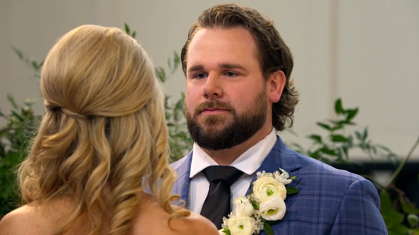 'Love Is Blind' Season 10 couple Amber Morrison, and Jordan Faeth on their wedding day. Jordan is looking worried as he faces Amber.