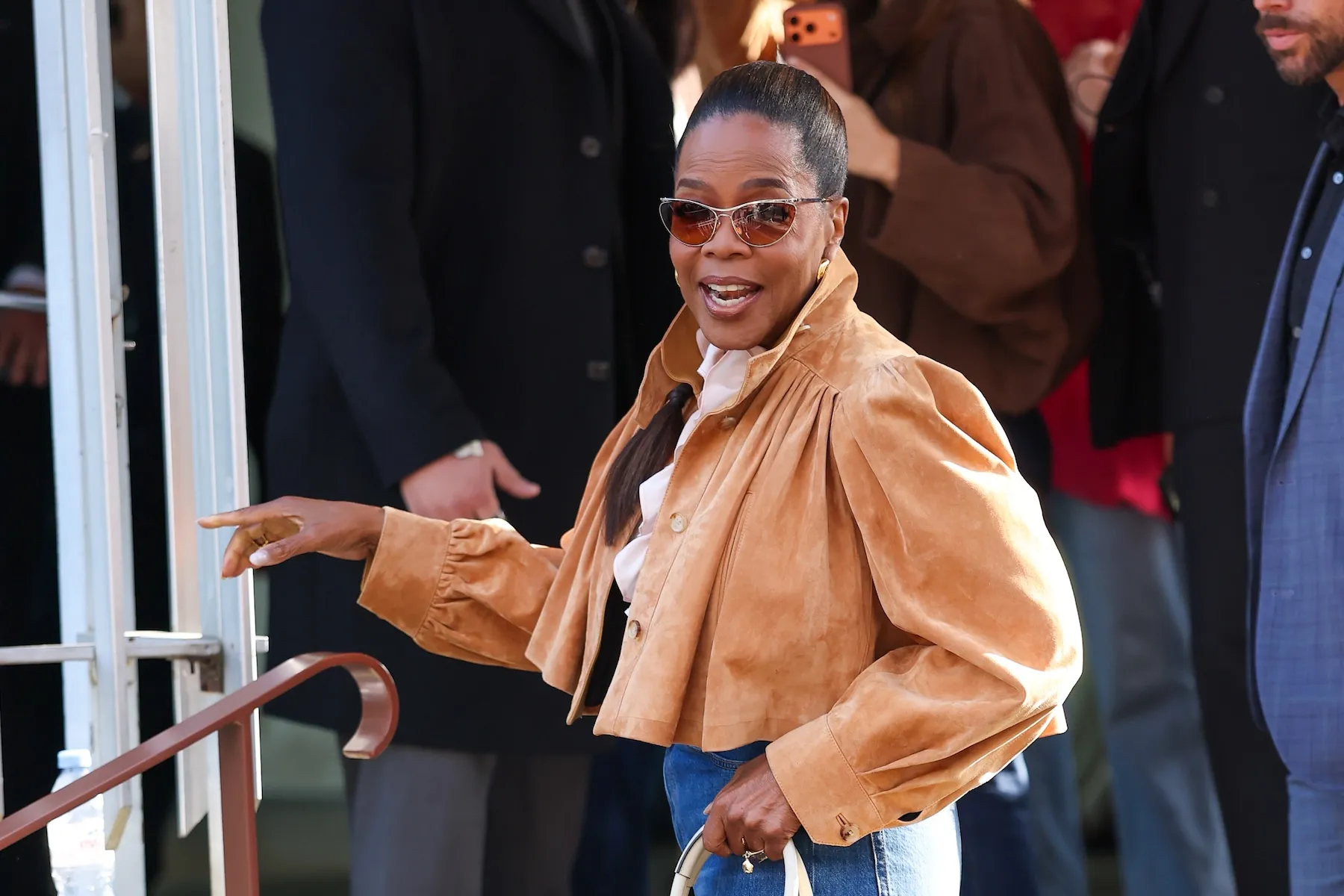 Oprah Stuns in Suede at Fashion Week Amid Ozempic Buzz