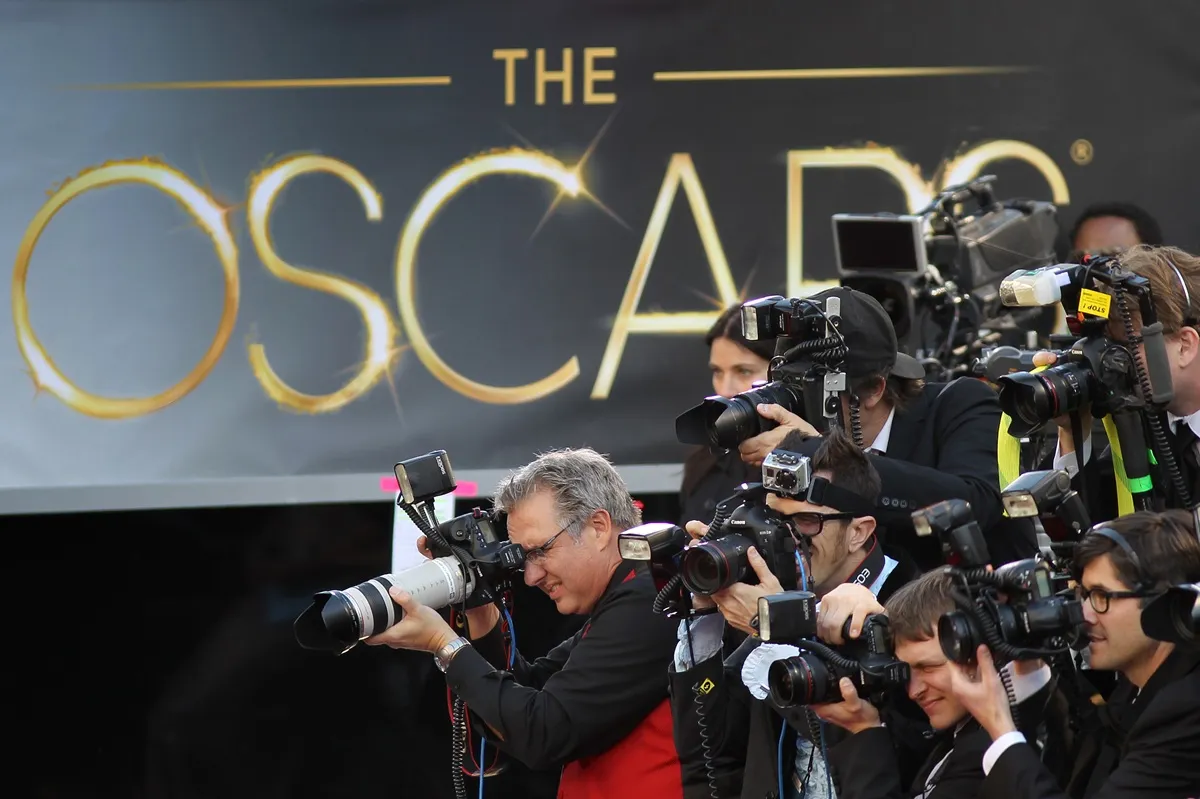 Photographers cover the red carpet arrivals to the 85th Annual Academy Awards at the Hollywood & Highland Center