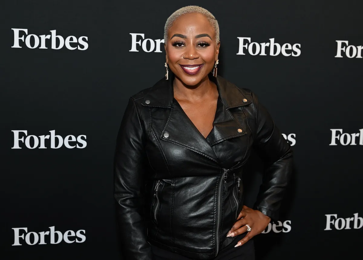 RHOA cast member Pinky Cole in a black leather jacket at a Forbes event