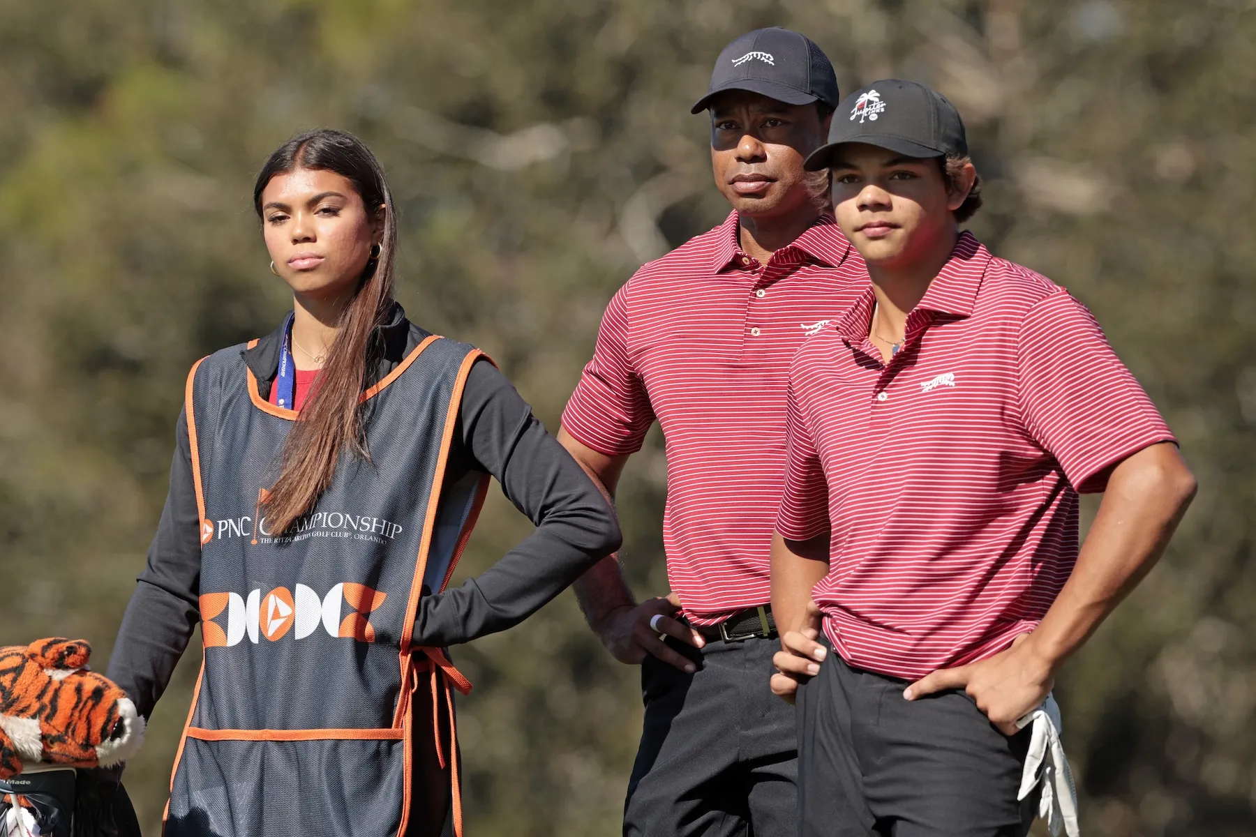Tiger Woods golfing with his kids, Sam Woods and Charlie Woods, in 2024