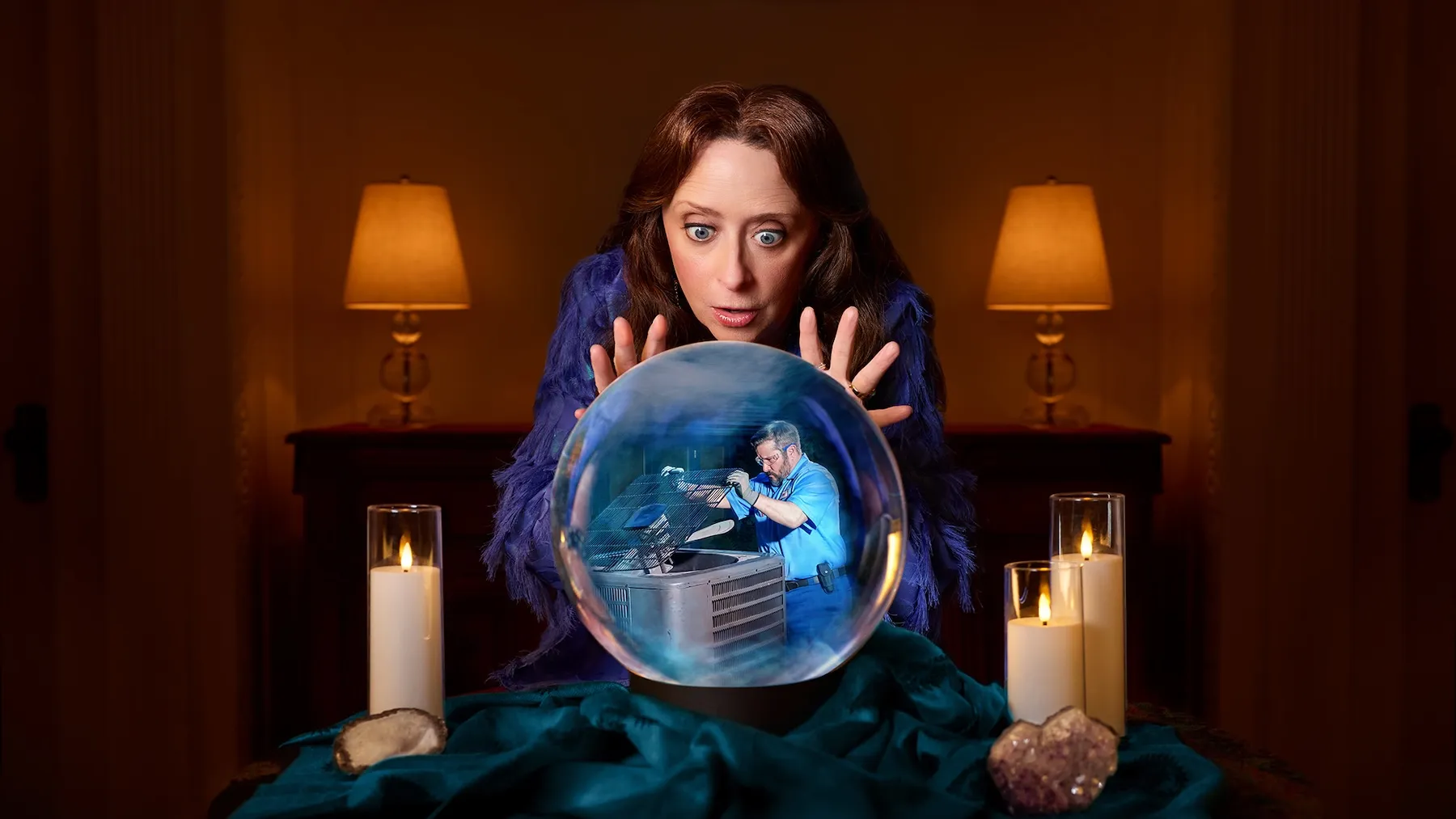 Rachel Dratch as Warrantina for American Home Shield. She's hovering over a crystal ball.