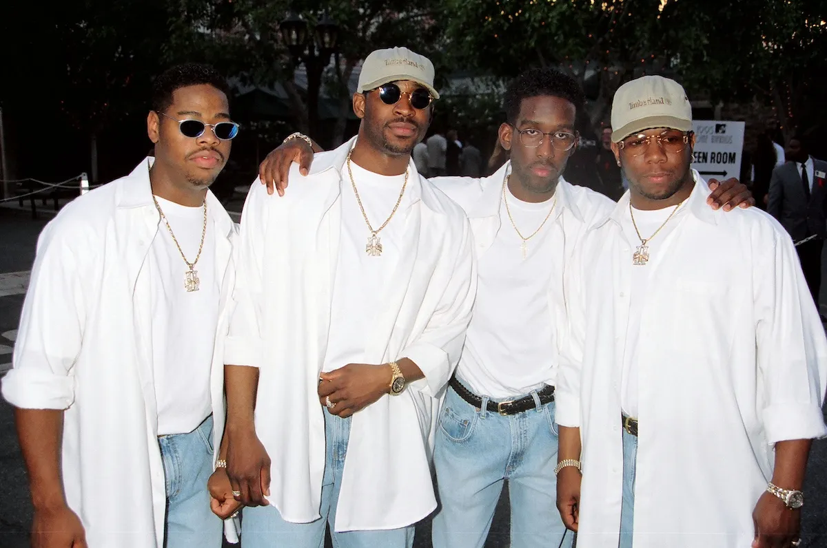 members of Boyz II Men, dressed in white shirts, in 1995