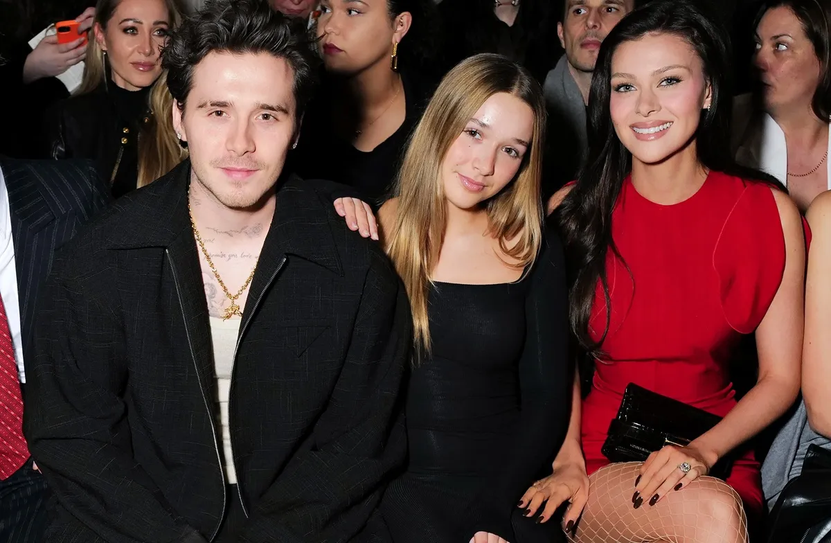 Brooklyn Peltz Beckham, Harper Beckham, and Nicola Peltz Beckham attend the Victoria Beckham AW24 show