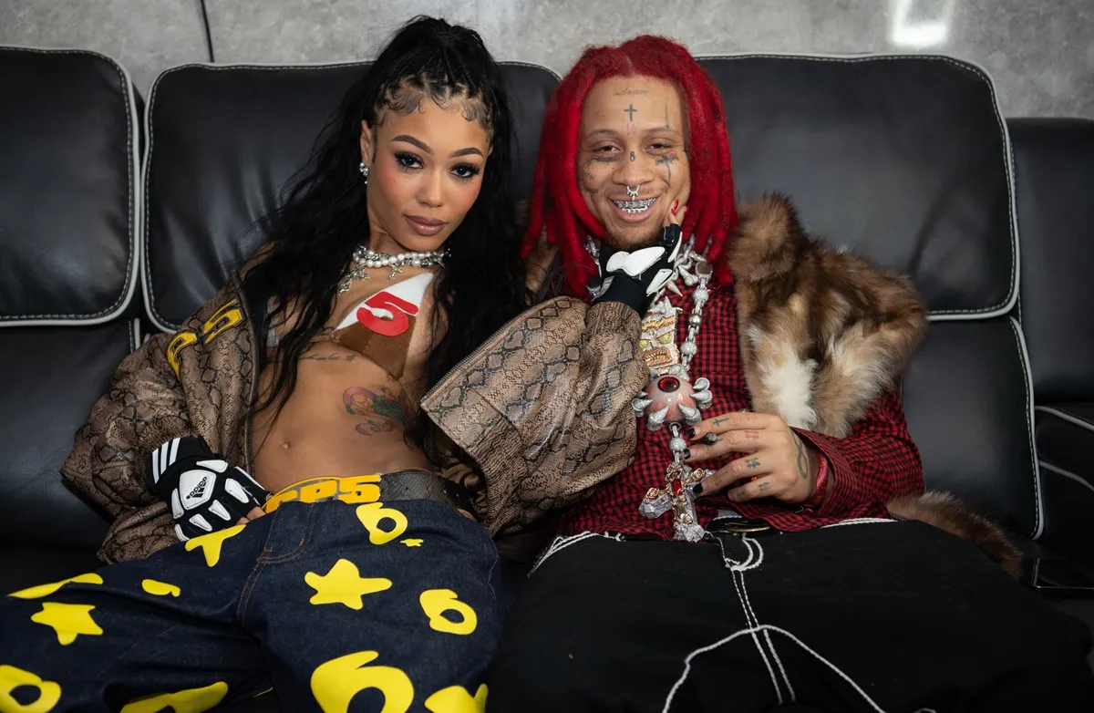 Coi Leray and Trippie Redd backstage during Revolt World 2024 at Pangaea Studios in Atlanta