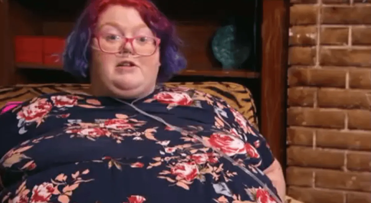Dolly Martinez, with red hair and glasses, in 'My 600-lb Life'