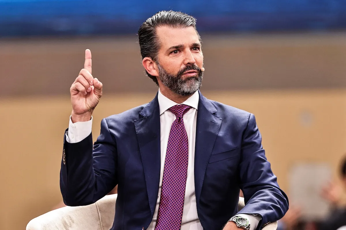 Donald Trump Jr holding up one finger