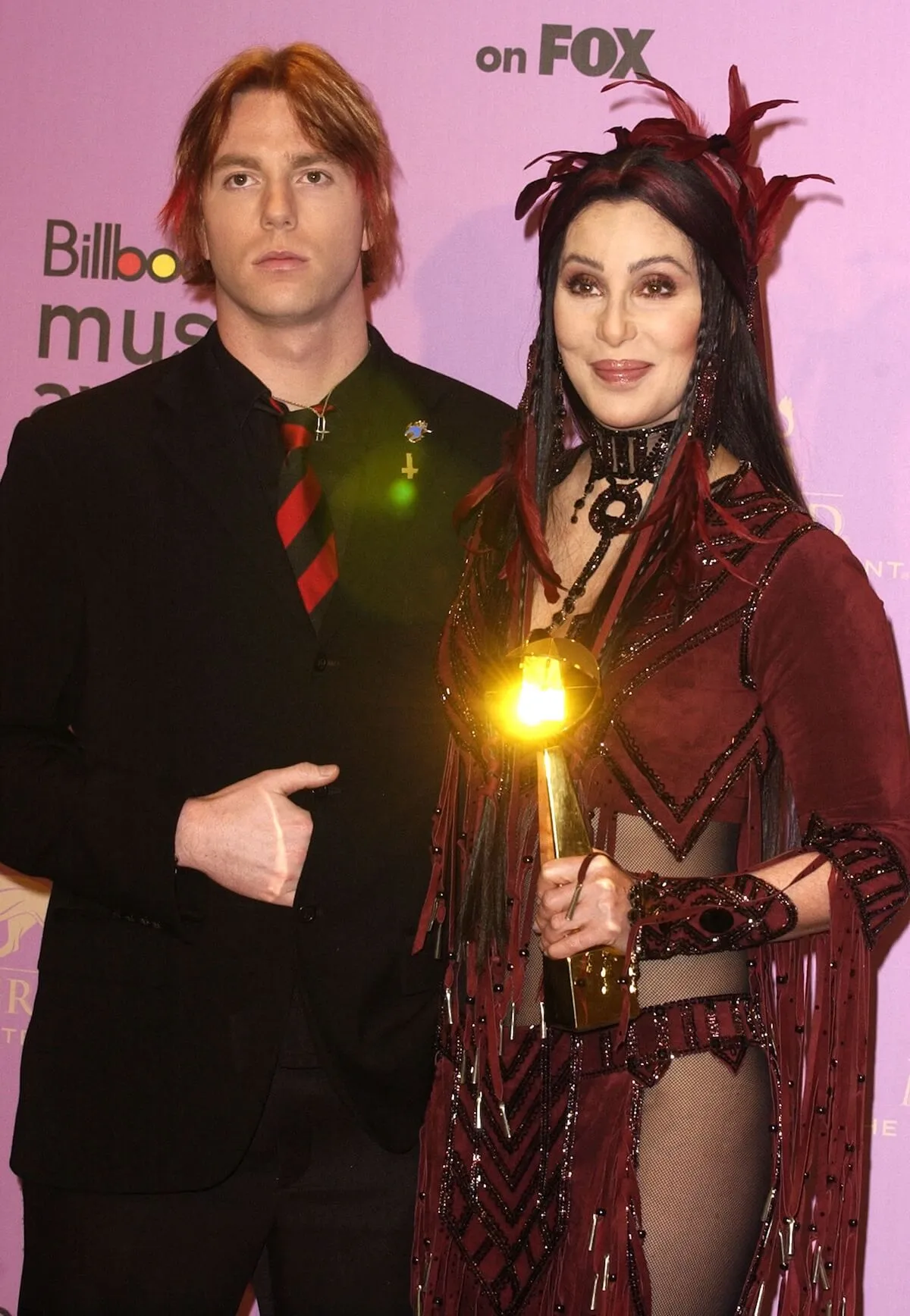 Elijah Blue Allman and Cher pose for a photo at the 2002 Billboard Music Awards