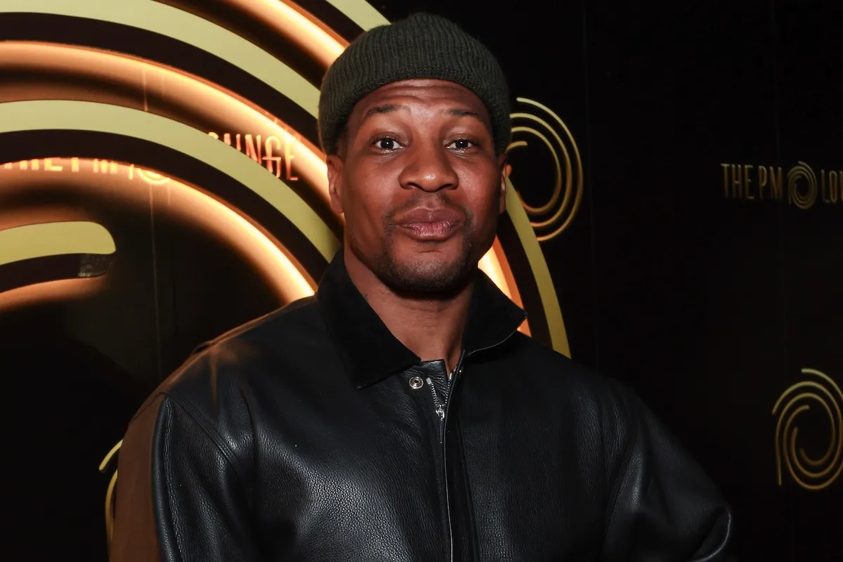 Jonathan Majors wearing a beanie