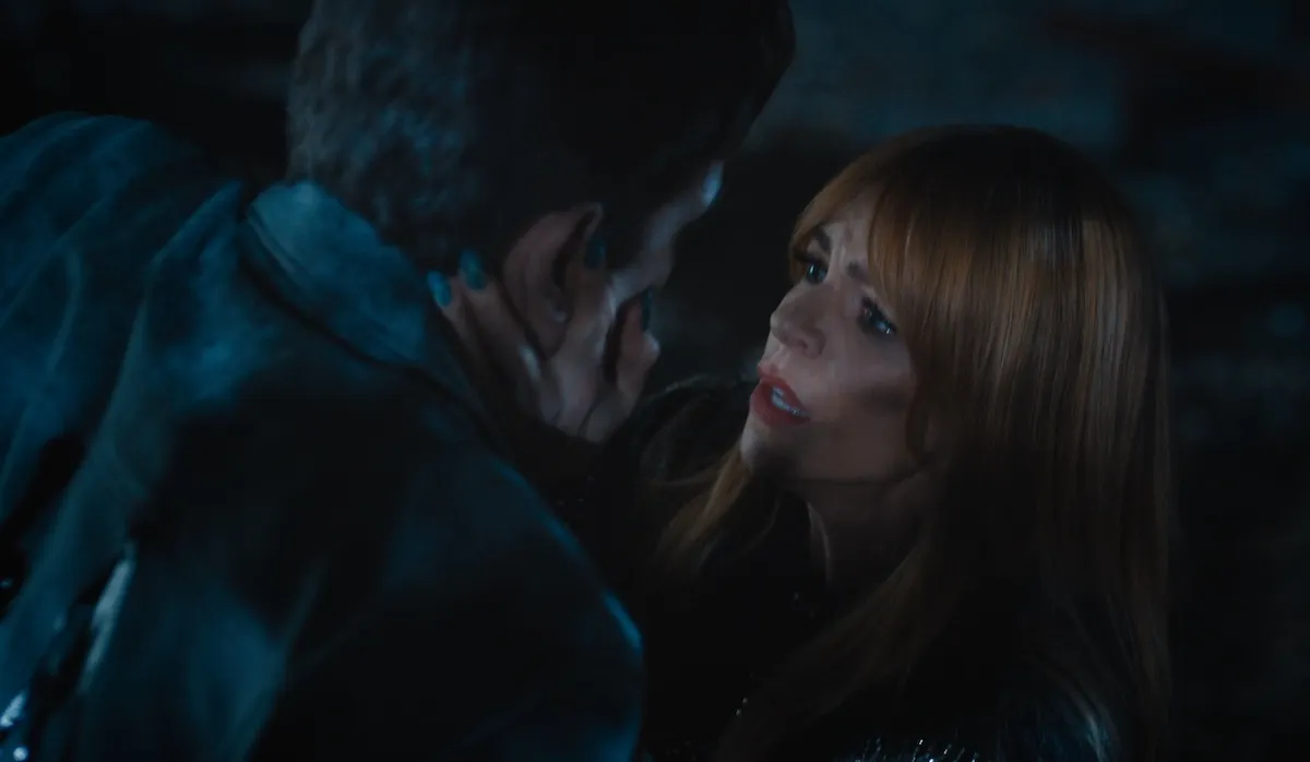 Kaitlin Olson kneeling in front of Wagner in 'High Potential' Season 2