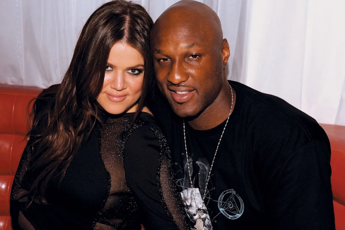 Khloe Kardashian and Lamar Odom posing side by side in 2009