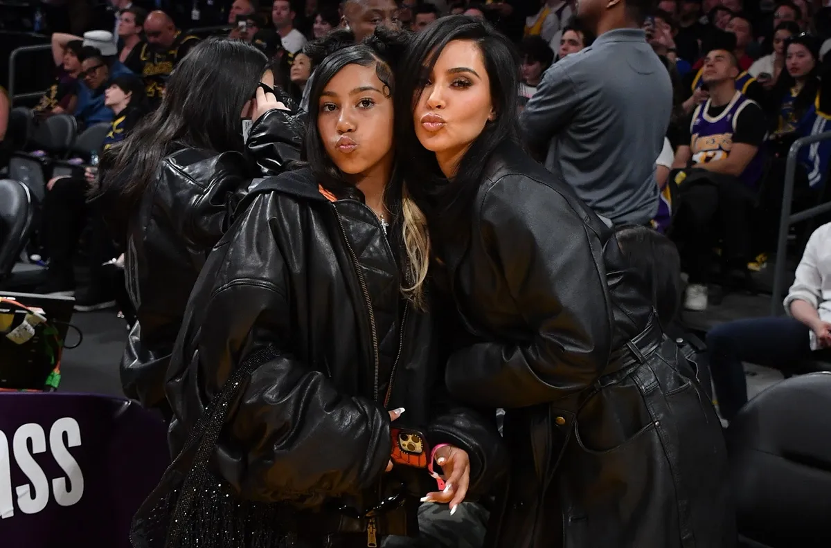 Kim Kardashian and North West attend a basketball game between the Los Angeles Lakers and the Golden State Warriors