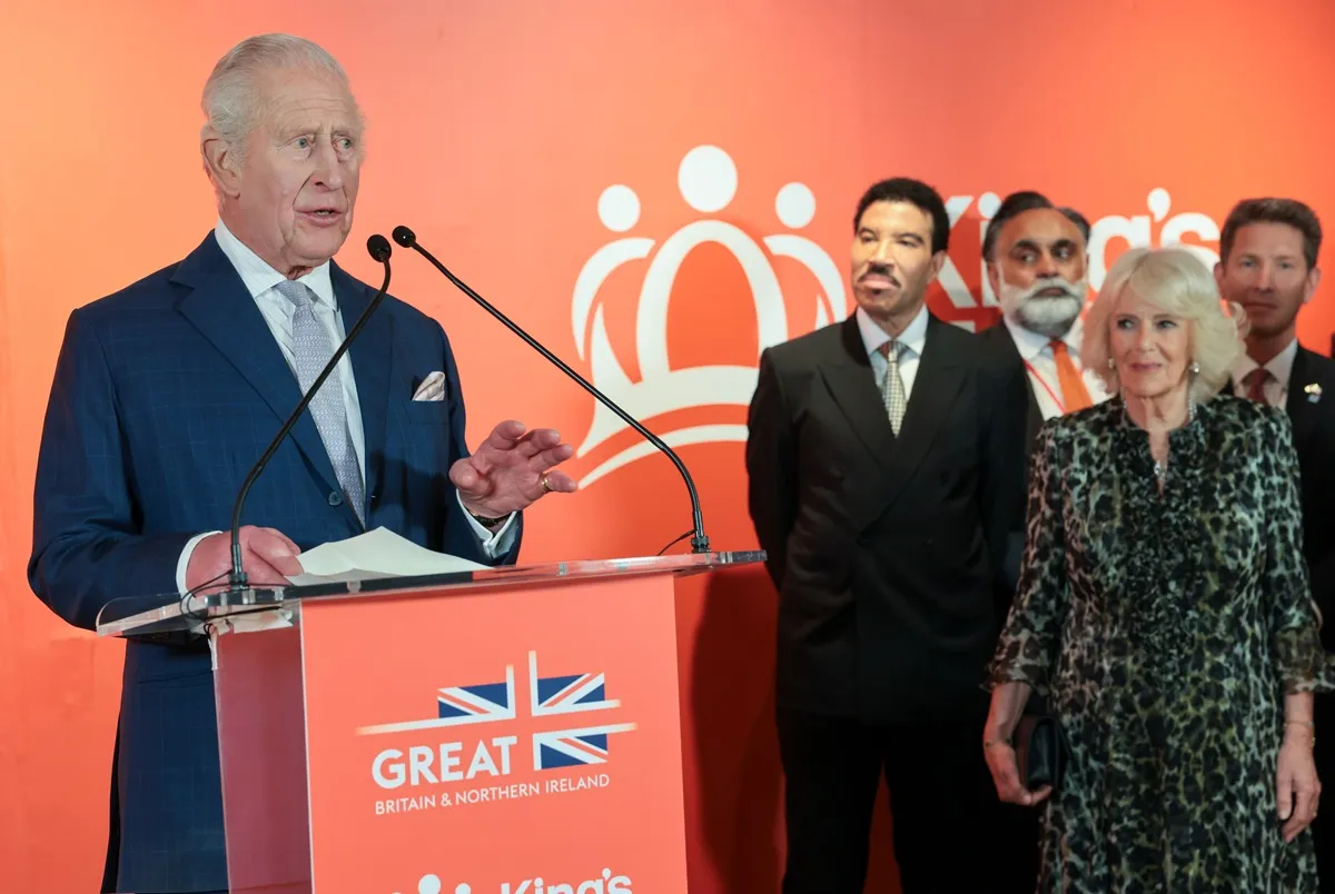 King Charles III addresses attendees as Lionel Richie and Queen Camilla watch during the King's Trust Global Gala at Rockefeller Center in New York City