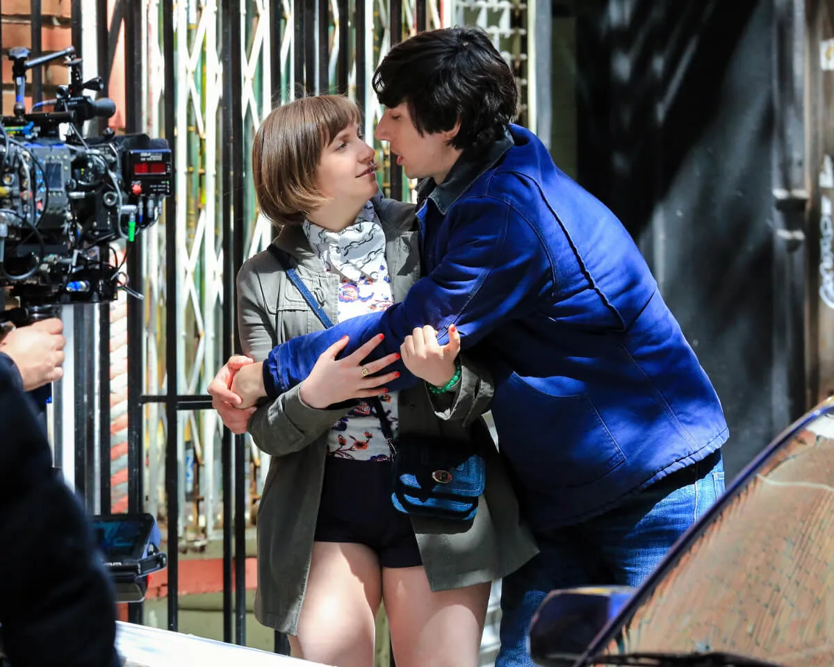Adam Driver embraces Lena Dunham on the set of 'Girls.'