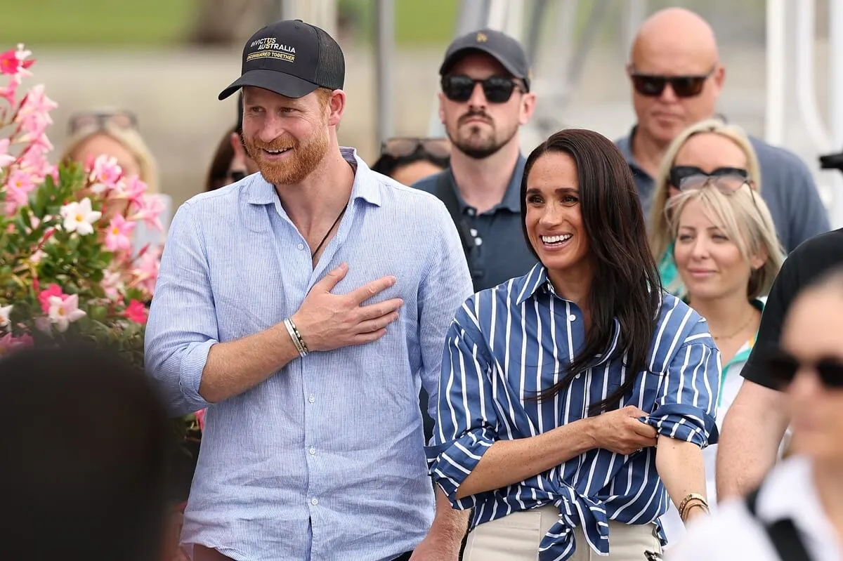 Prince Harry and Meghan Markle greet members of the public at the Cruising Yacht Club of Australia