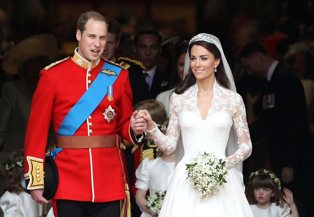 Prince William and Kate Middleton smile following their marriage at Westminster Abbey on April 29, 2011