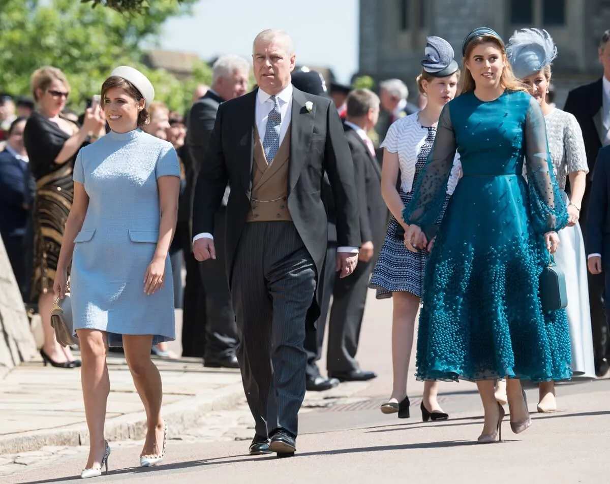 Princess Eugenie, Andrew Mountbatten-Windsor, and Princess Beatrice attend the wedding of Prince Harry and Meghan Markle