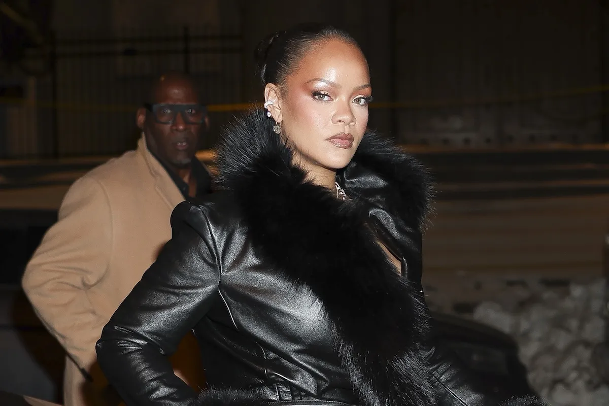 Rihanna in a black coat at night in New York City in February 2026