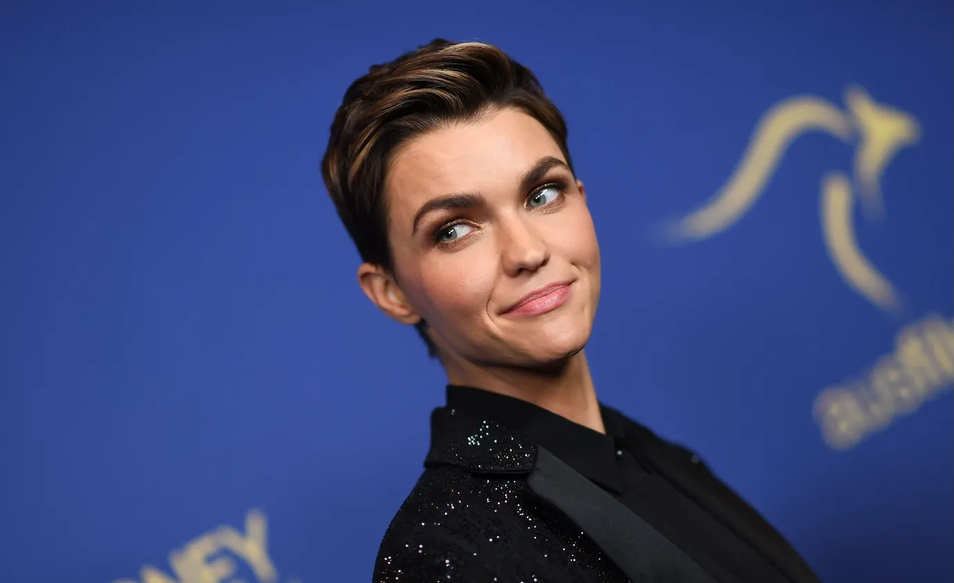 A close-up of Australian actress Ruby Rose in 2019 against a blue background