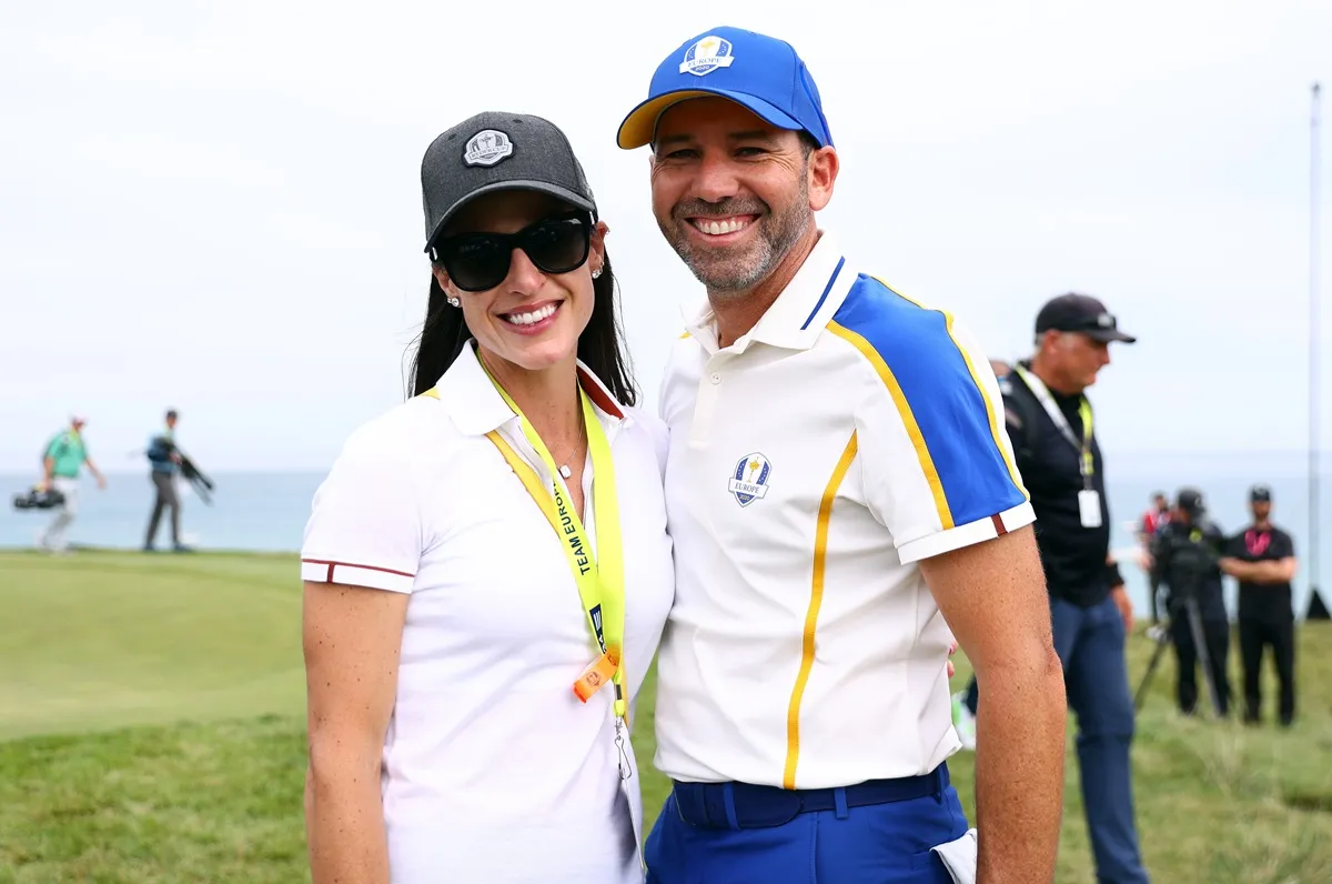Sergio Garcia of Spain and team Europe and wife Angela Akins Garcia pose during Sunday Singles Matches