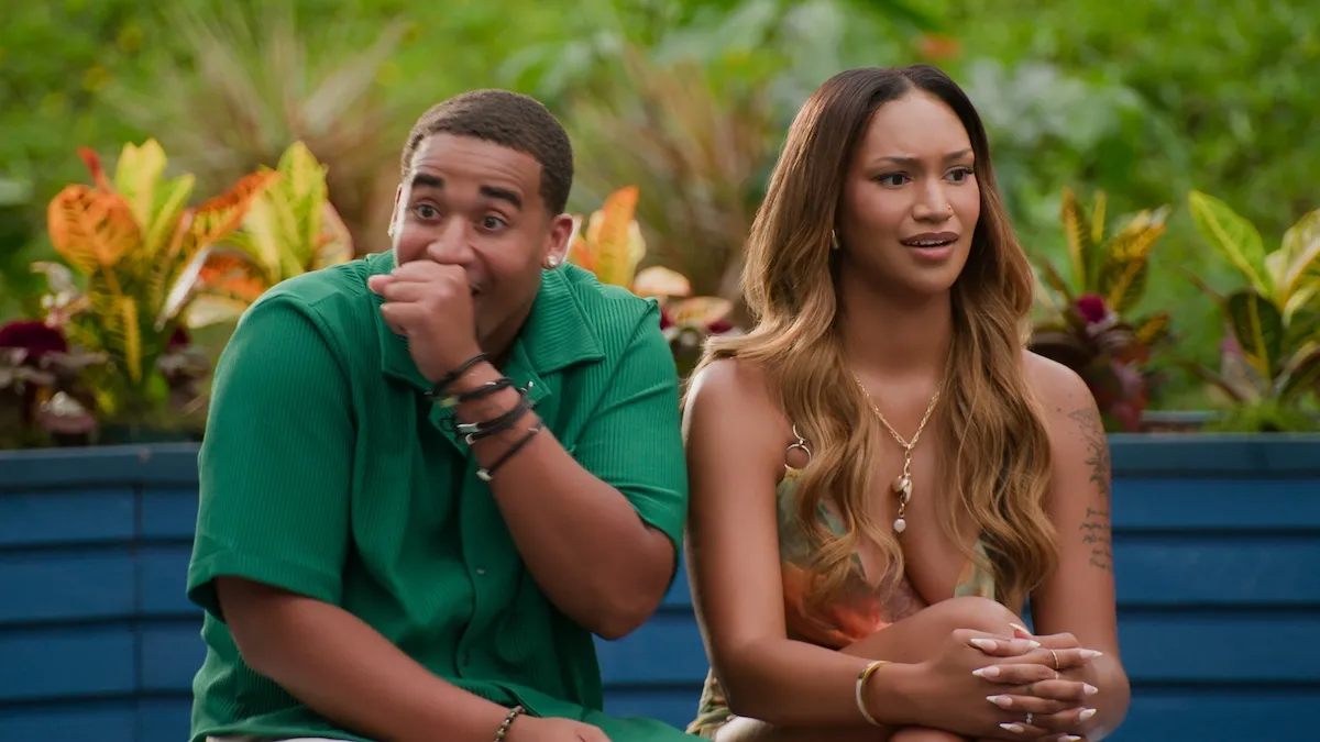 Two cast members on 'Temptation Island' Season 2 sitting next to each other