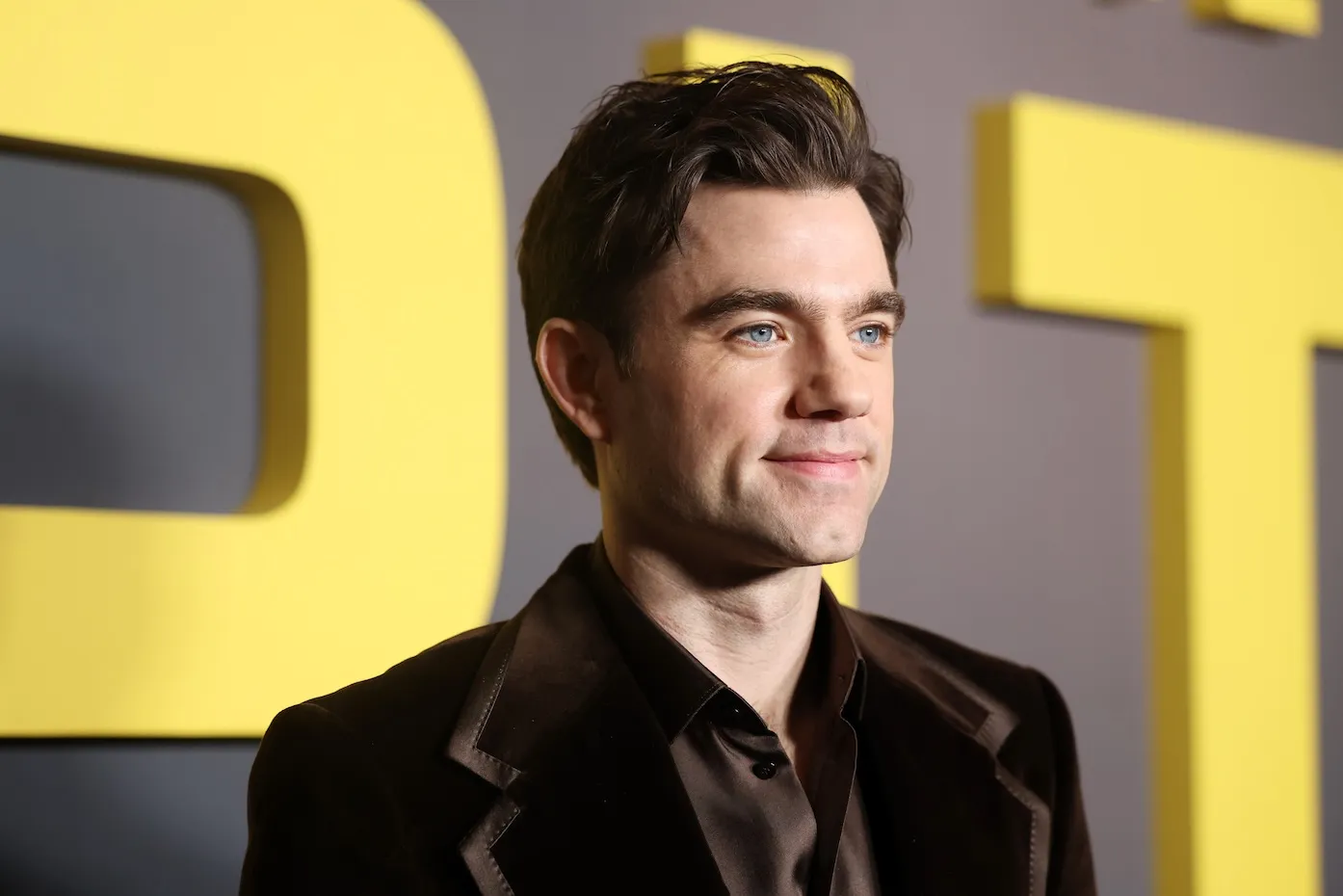 'The Pitt' actor Patrick Ball smiling at a red carpet premiere