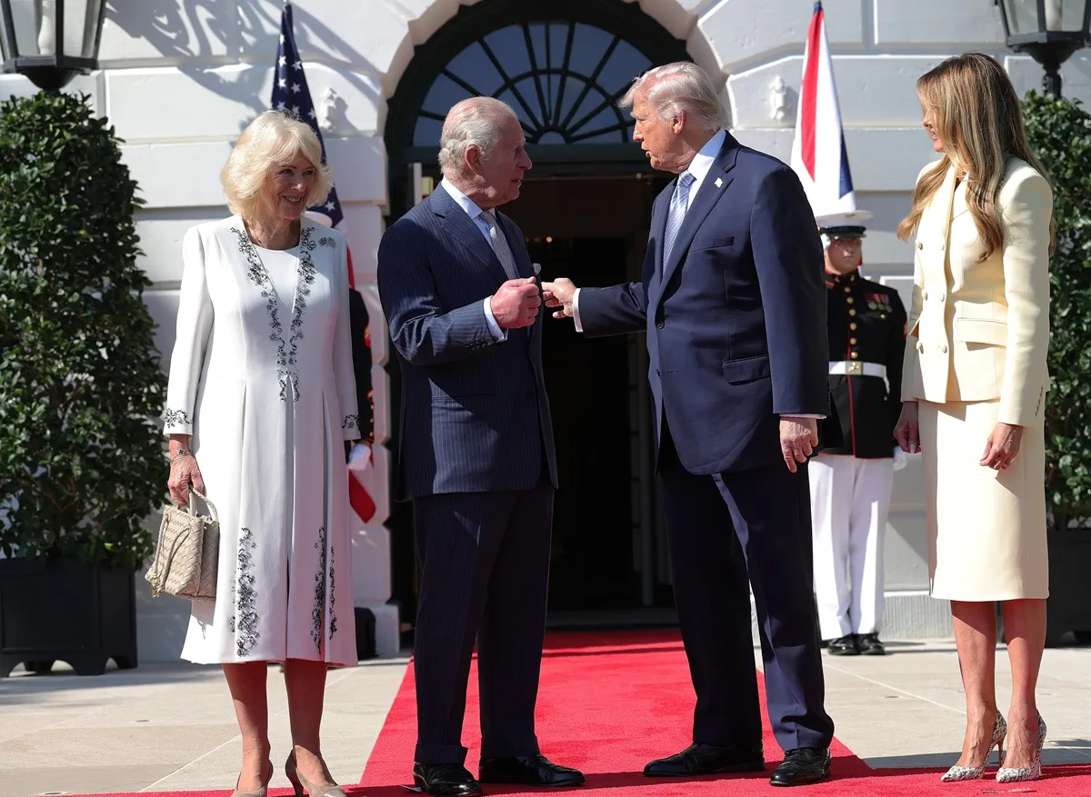 U.S. President Donald Trump and first lady Melania Trump greet Queen Camilla and King Charles III on the South Lawn of the White House