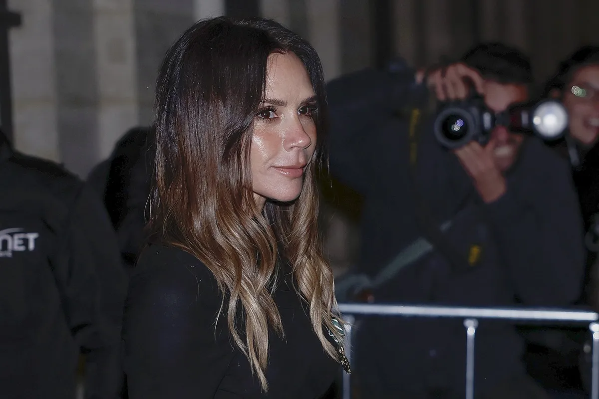 Victoria Beckham leaves after being awarded Knight of the Order of Arts and Letters