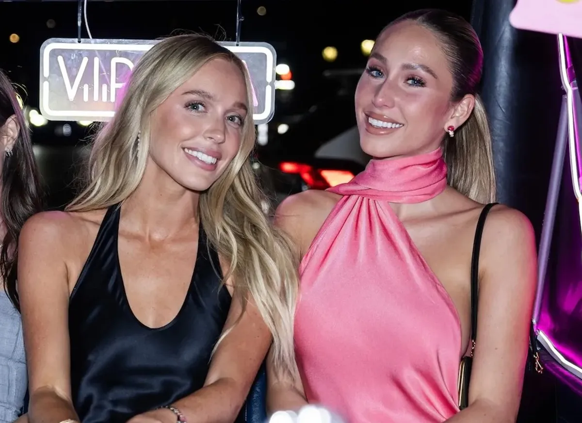 Alex Cooper and AlixEarle smile for photo together