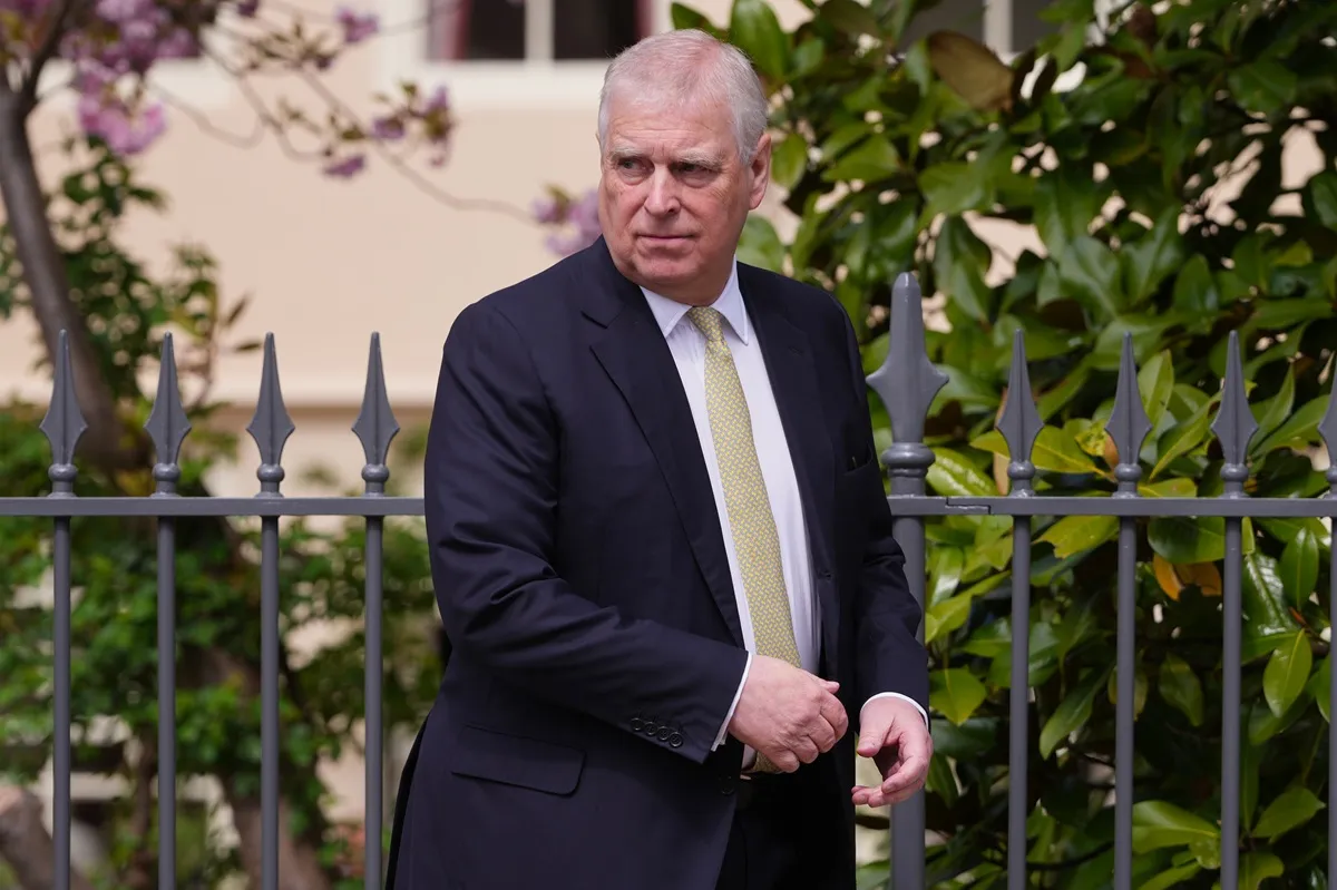 Andrew Mountbatten-Windsor looks round as he leaves after attending the Easter Matins Service