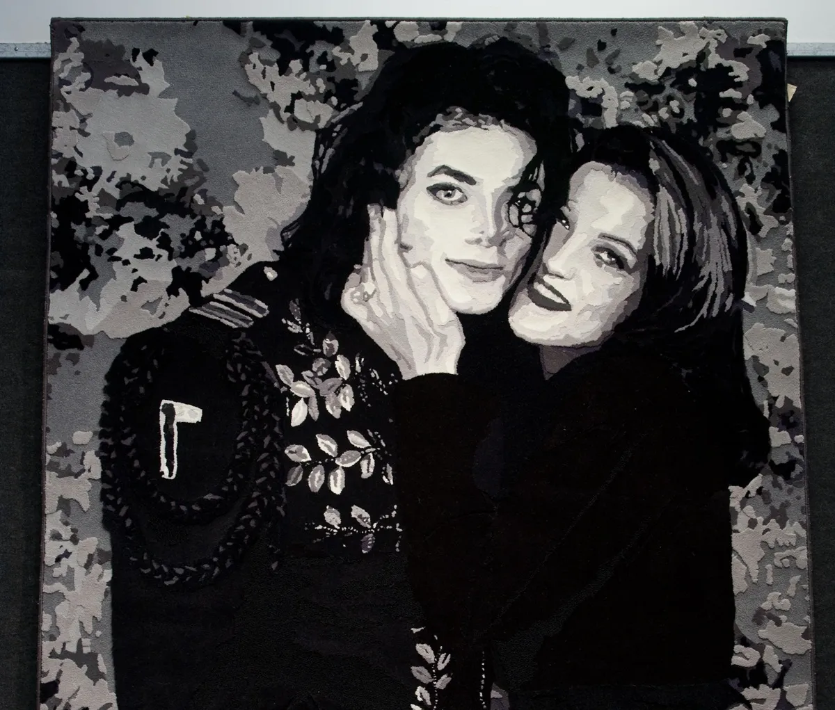 Michael Jackson and Lisa Maria Presley enormous customized area rug (1994) at the Auction Preview At Bonhams & Butterfields on December 18, 2009