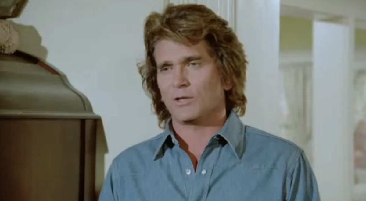 Michael Landon wearing a blue denim shirt in 'Highway to Heaven'