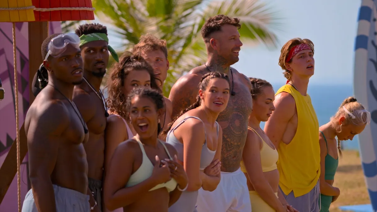 The cast of 'Perfect Match' Season 4 standing outside on the beach