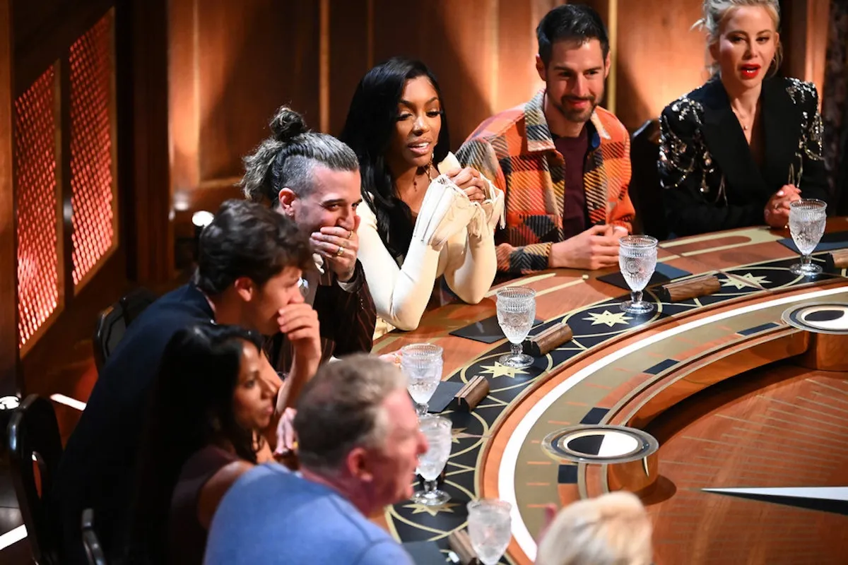 'The Traitors' season 4 cast member sitting at the round table