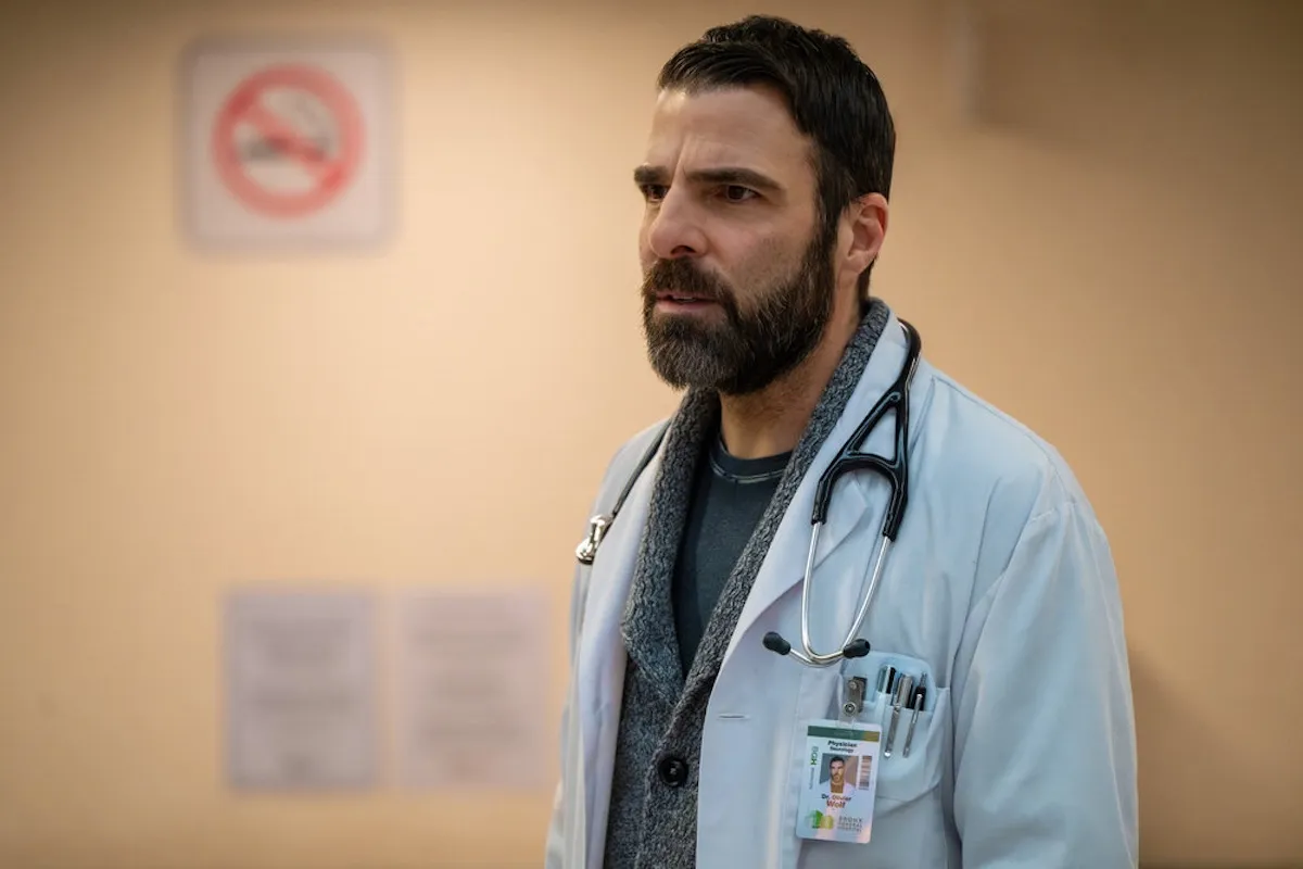 Zachary Quinto wearing a white medical coat