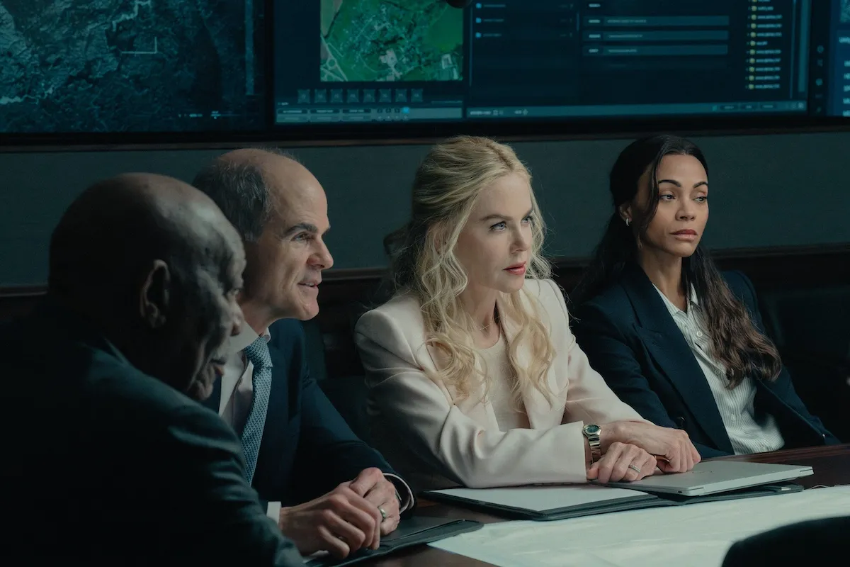 Morgan Freeman, Michaeal Kelly, Nicole Kidman, and Zoe Saldana sitting at a conference table in 'Lioness' Season 3