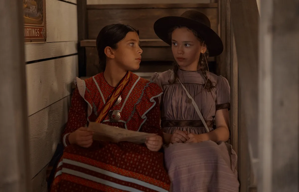 Good Eagle and Laura looking at each other in Netflix's 'Little House on the Prairie'