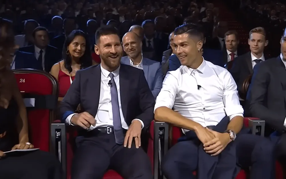 Screenshot of Lionel Messi and Cristiano Ronaldo being interviewed at the UEFA Champions League Draw