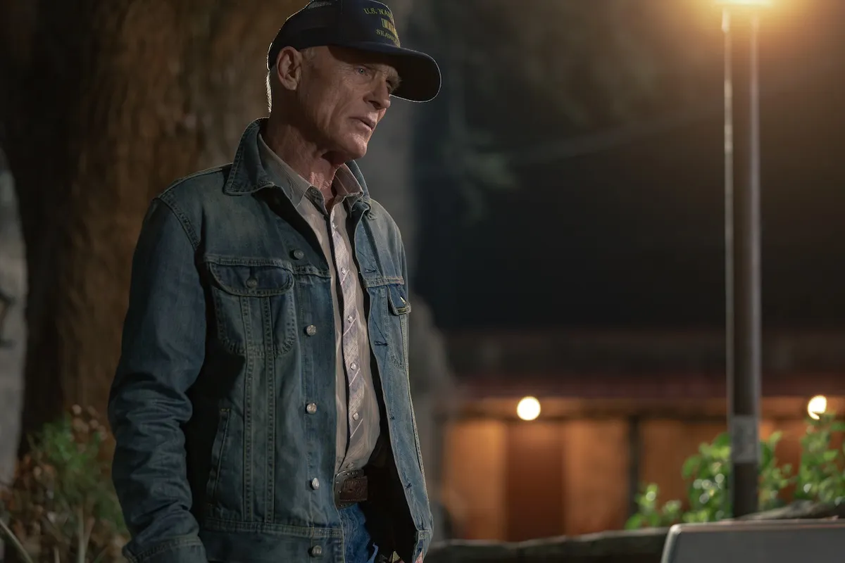 Ed Harris wearing a baseball hat and demin jacket in 'Dutton Ranch'