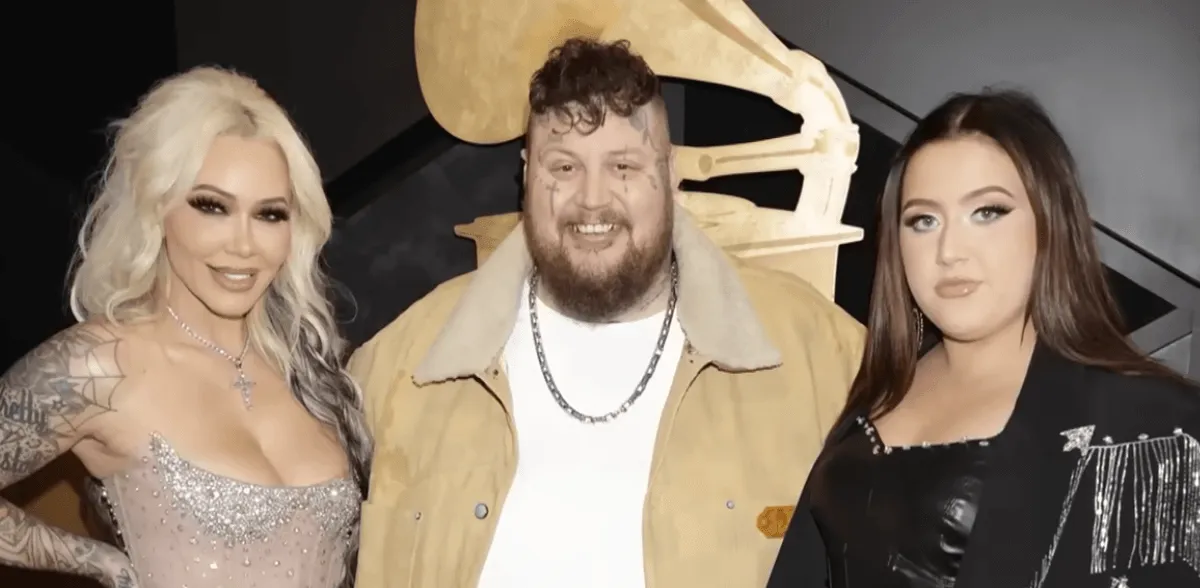 Bunnie Xo, Jelly Roll, and his daughter Bailee Ann stand together.