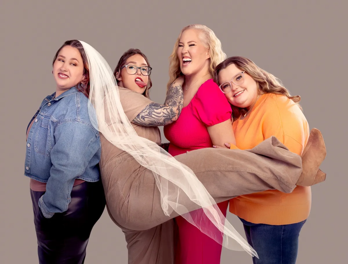 Portrait of Mama June Shannon with her daughters Jessica, wearing a wedding veil, Pumpkin, and Alana