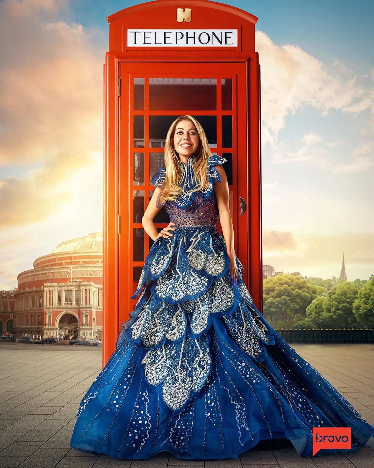 Real Housewives of London cast member Juliet Mayhew standing in front of red phone booth
