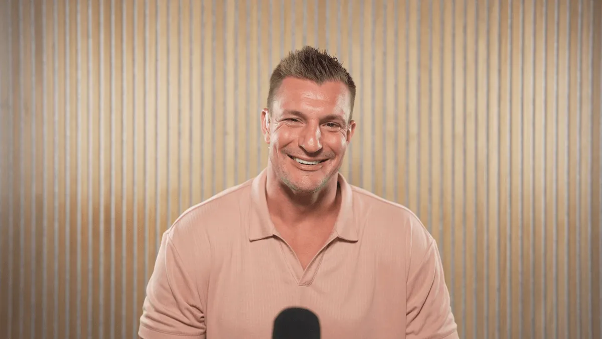 Rob Gronkowski wearing a polo shirt on 'The Other Football'