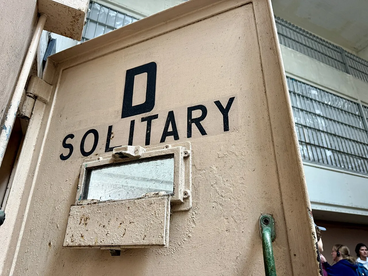 Image of prison door at Alcatraz reading 'Solitary'
