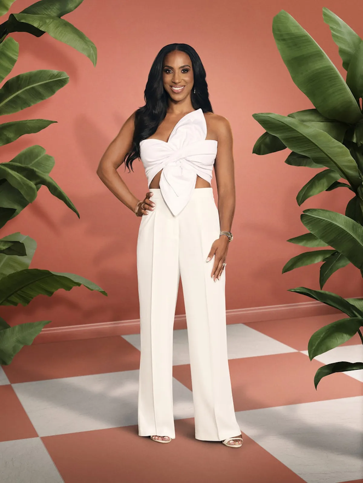 Annemarie Wiley of 'RHOBH' wearing a white pantsuit